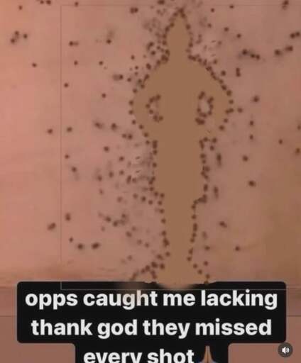 Caption: "opps caught me lackin thank god they missed every shot 🙏🏿"

Image is of a wall with ~40 bullet holes, the area without holes is shaped like the silhouette of an elf.